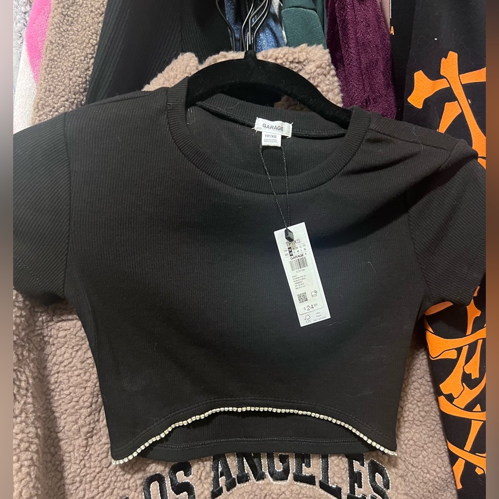 Black crop top with diamond cut bottom